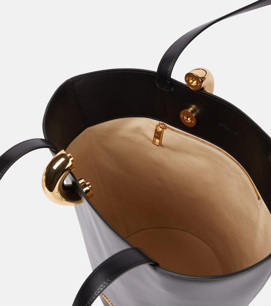 JACQUEMUS The Medium Bambola Asymmetric Leather Bucket Bag In Black 990 Product Image