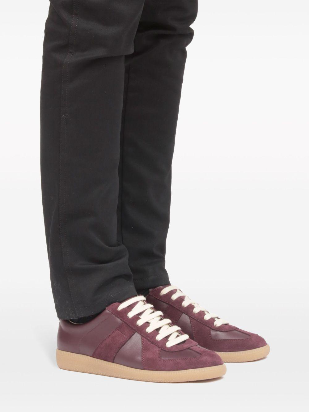 Replica low-top leather sneakers Product Image