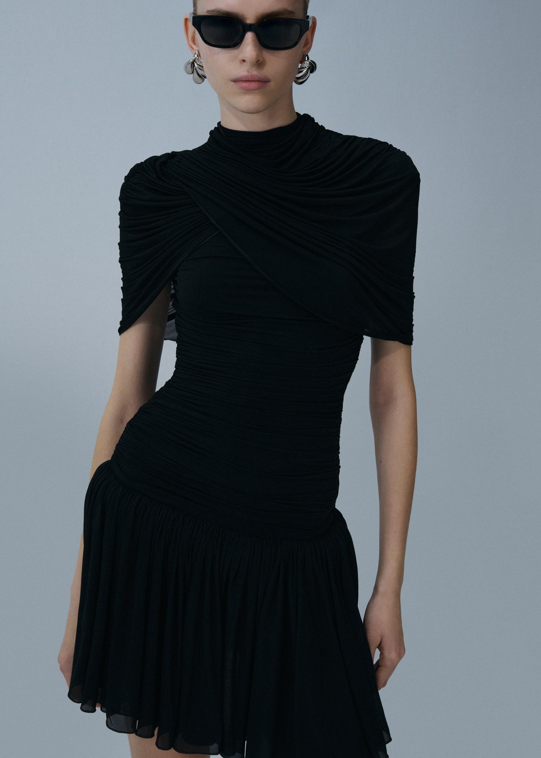 Drop-waist wrap mini dress in black Product Image