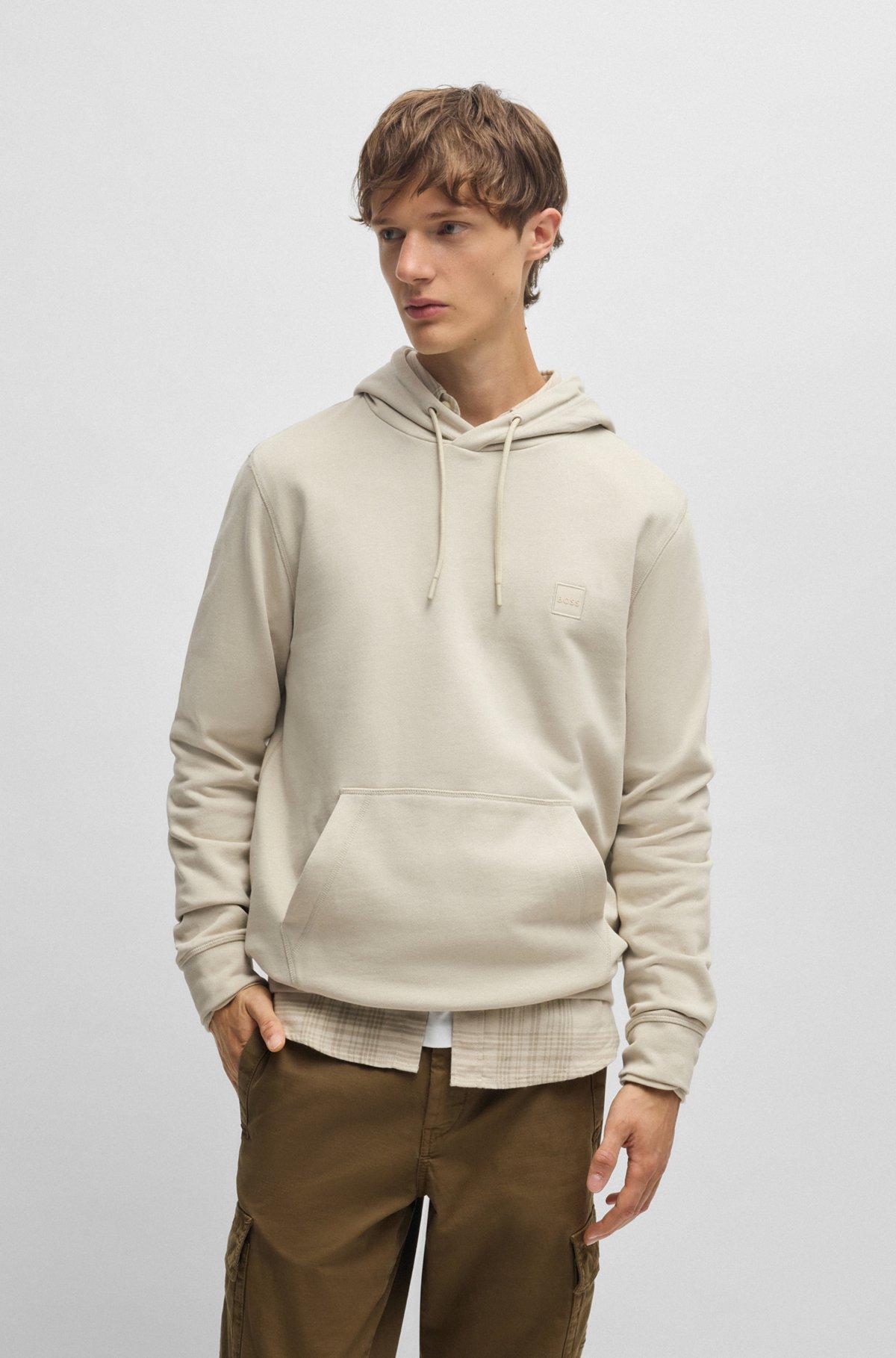 Cotton-terry hoodie with logo patch Product Image