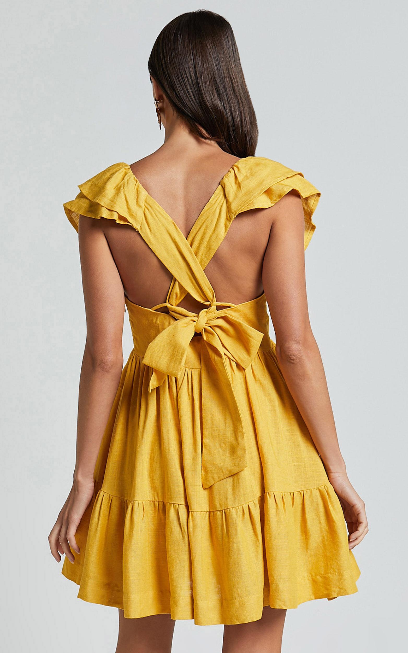 Amalie The Label - Hescia Linen Blend Frill Detail Low Back Mini Dress in Warm Yellow Gold Product Image