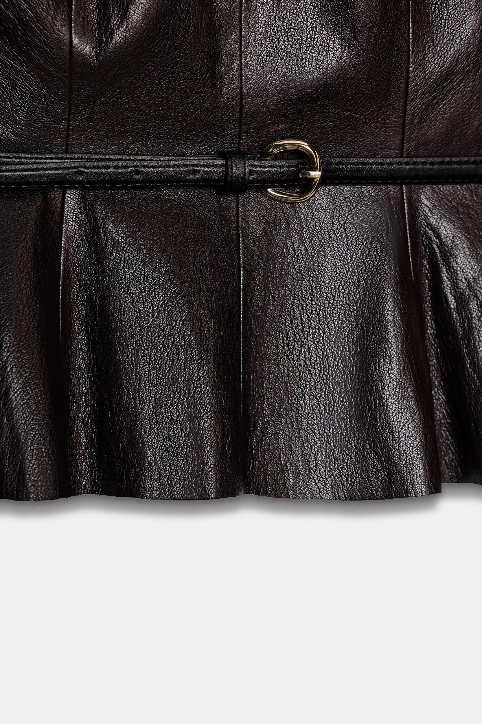 FAUX LEATHER BELTED TOP Product Image