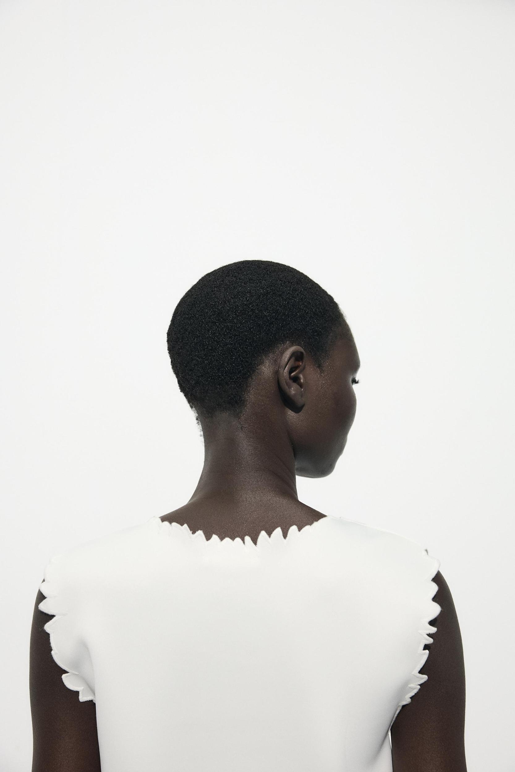 EMBROIDERED INTERLOCK TOP Product Image