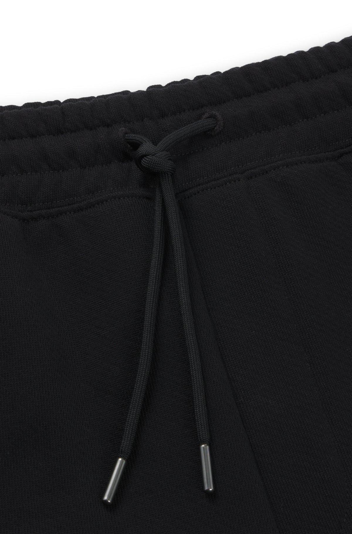 Loose-fit shorts in cotton terry with logo print Product Image