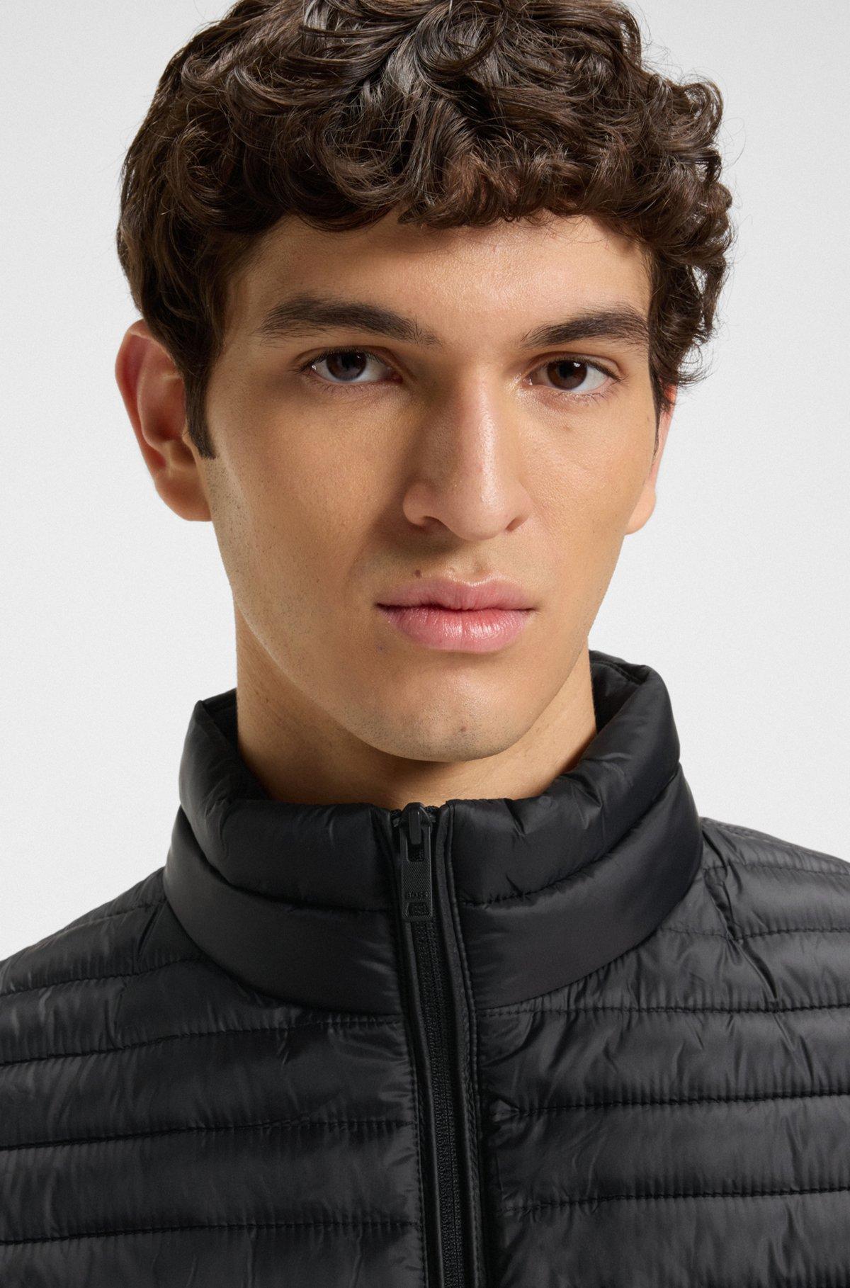 Water-repellent quilted field jacket with packable hood Product Image