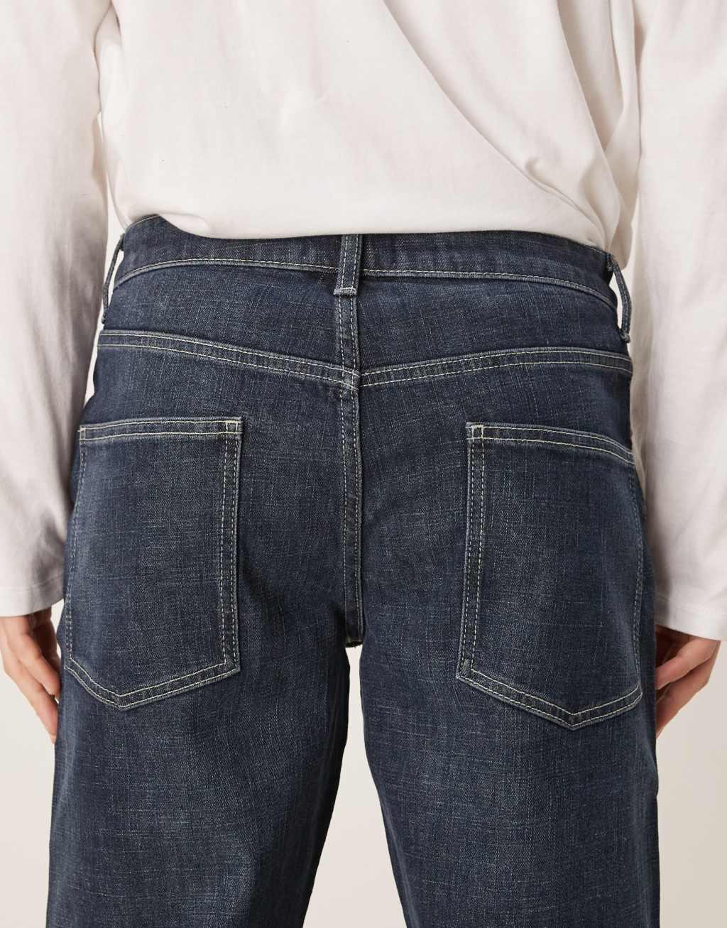 ASOS DESIGN stretch tapered jeans in dark wash blue Product Image