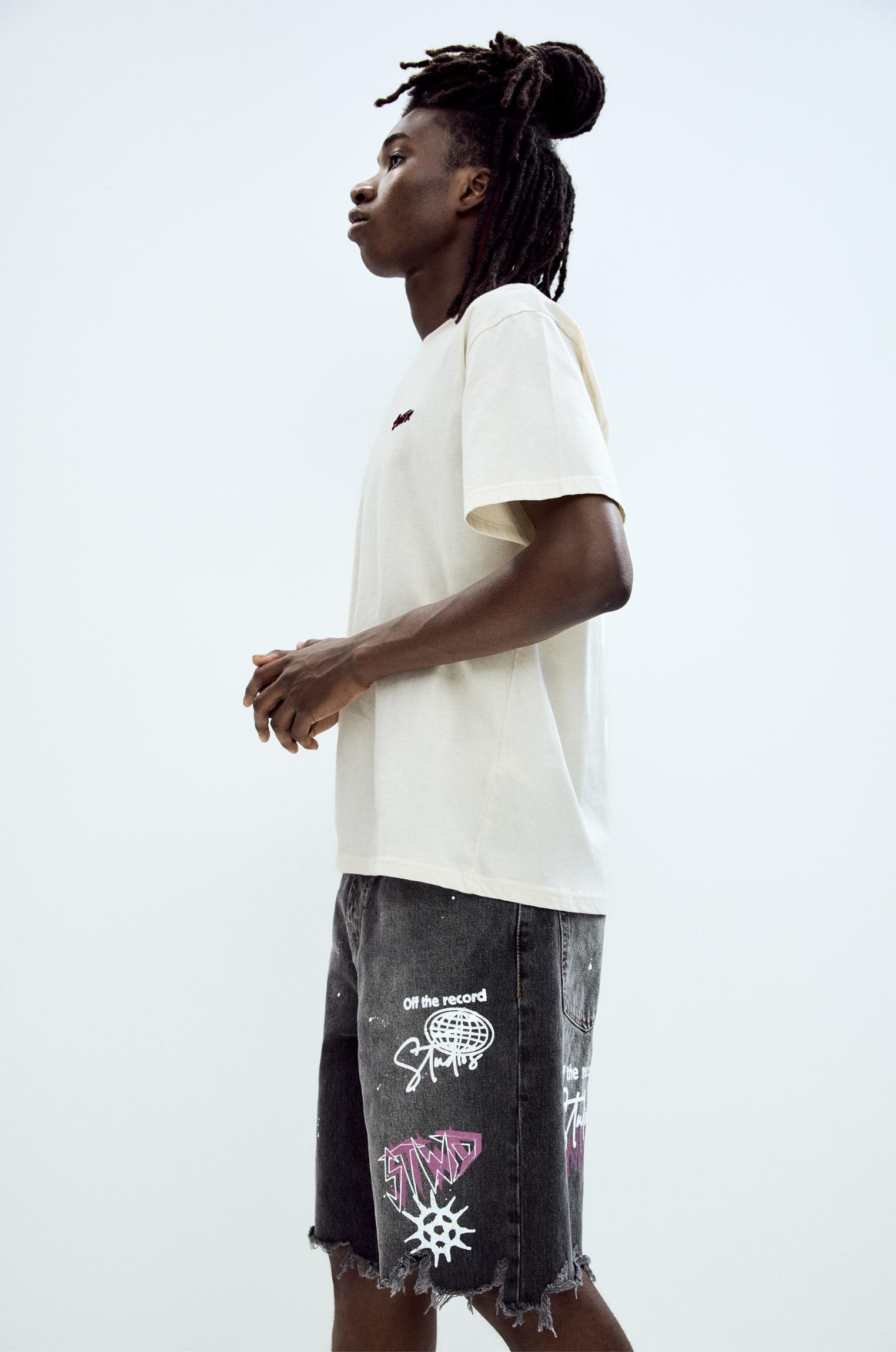 Ripped denim Bermuda shorts Product Image