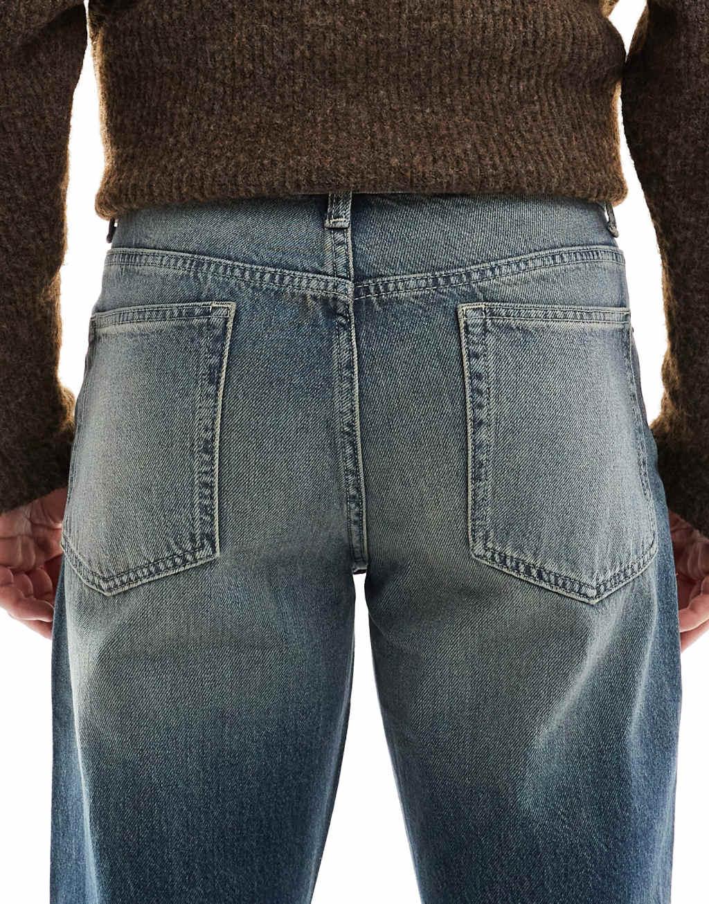 ASOS DESIGN wide flare jeans with tint in mid wash blue Product Image