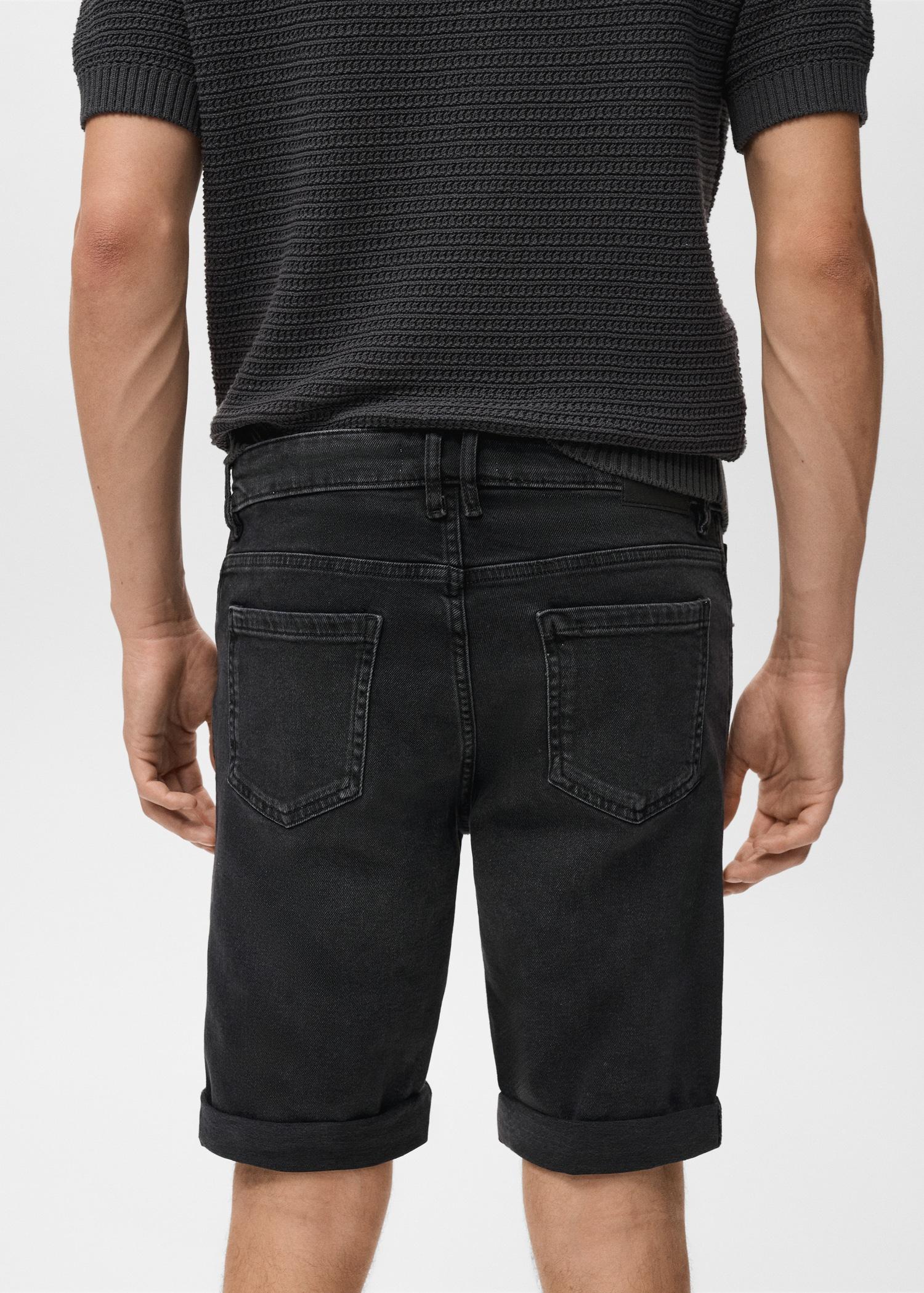 Slim-fit denim bermuda shorts - Men | MANGO USA Product Image