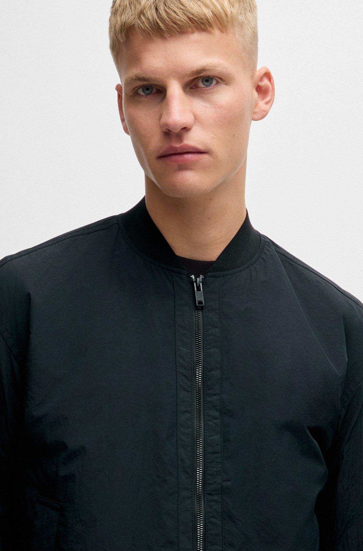 Water-repellent bomber jacket with logo badge Product Image