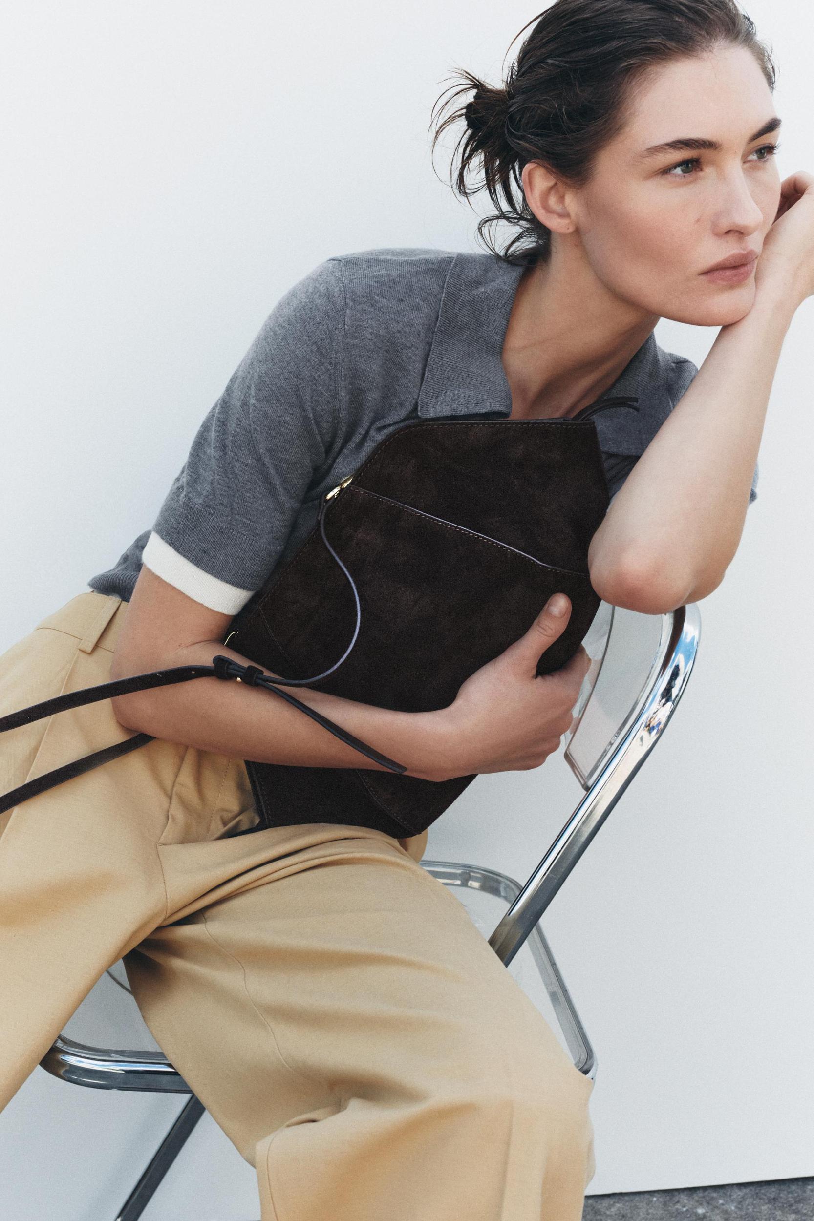 SPLIT LEATHER TOPSTITCH CLUTCH Product Image