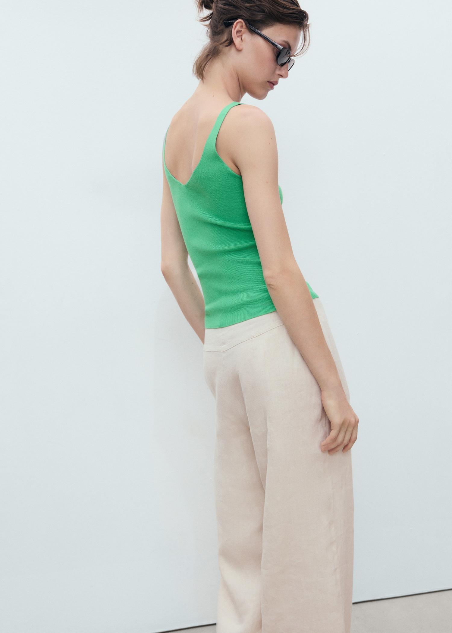 V-neck knitted top - Women | MANGO USA Product Image