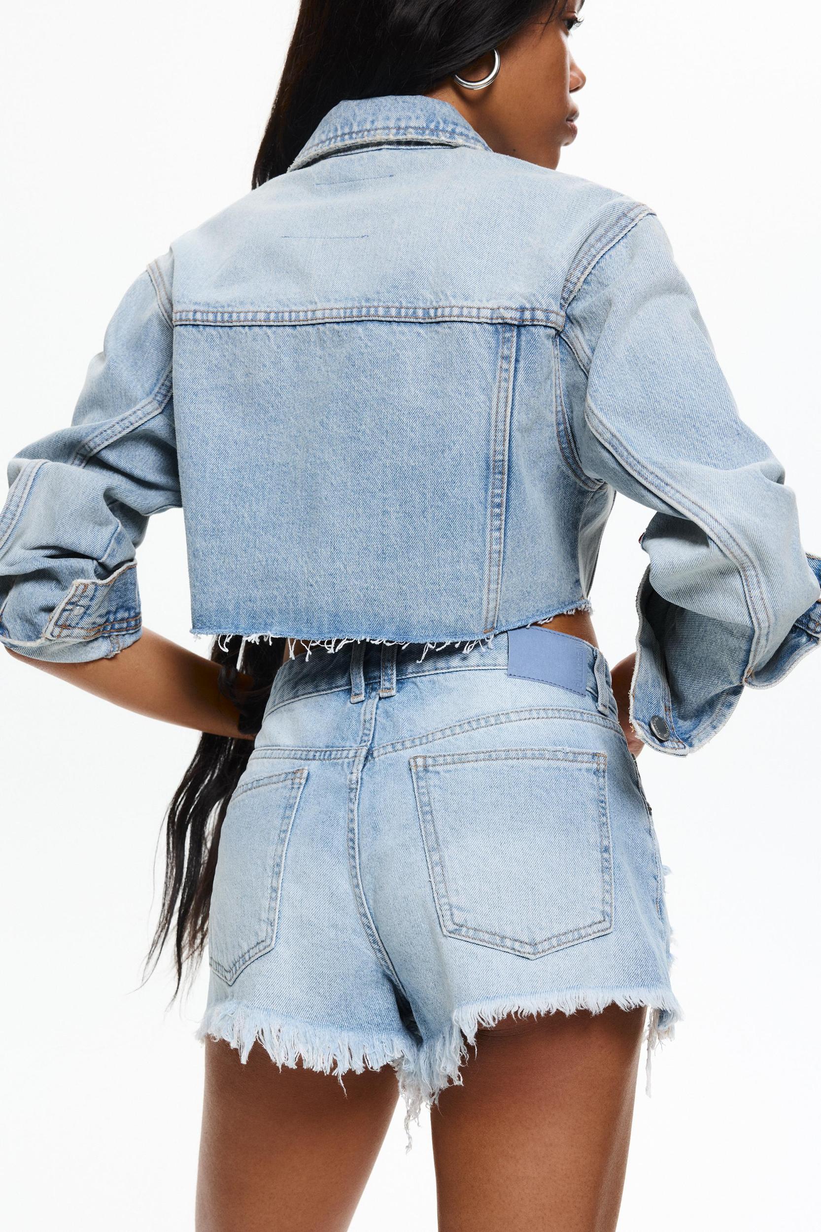 Ripped hem denim shorts Product Image