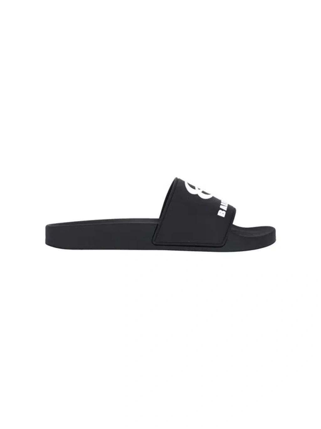 BALENCIAGA Rubber Slide Sandals For The Pool Men In Black White Product Image