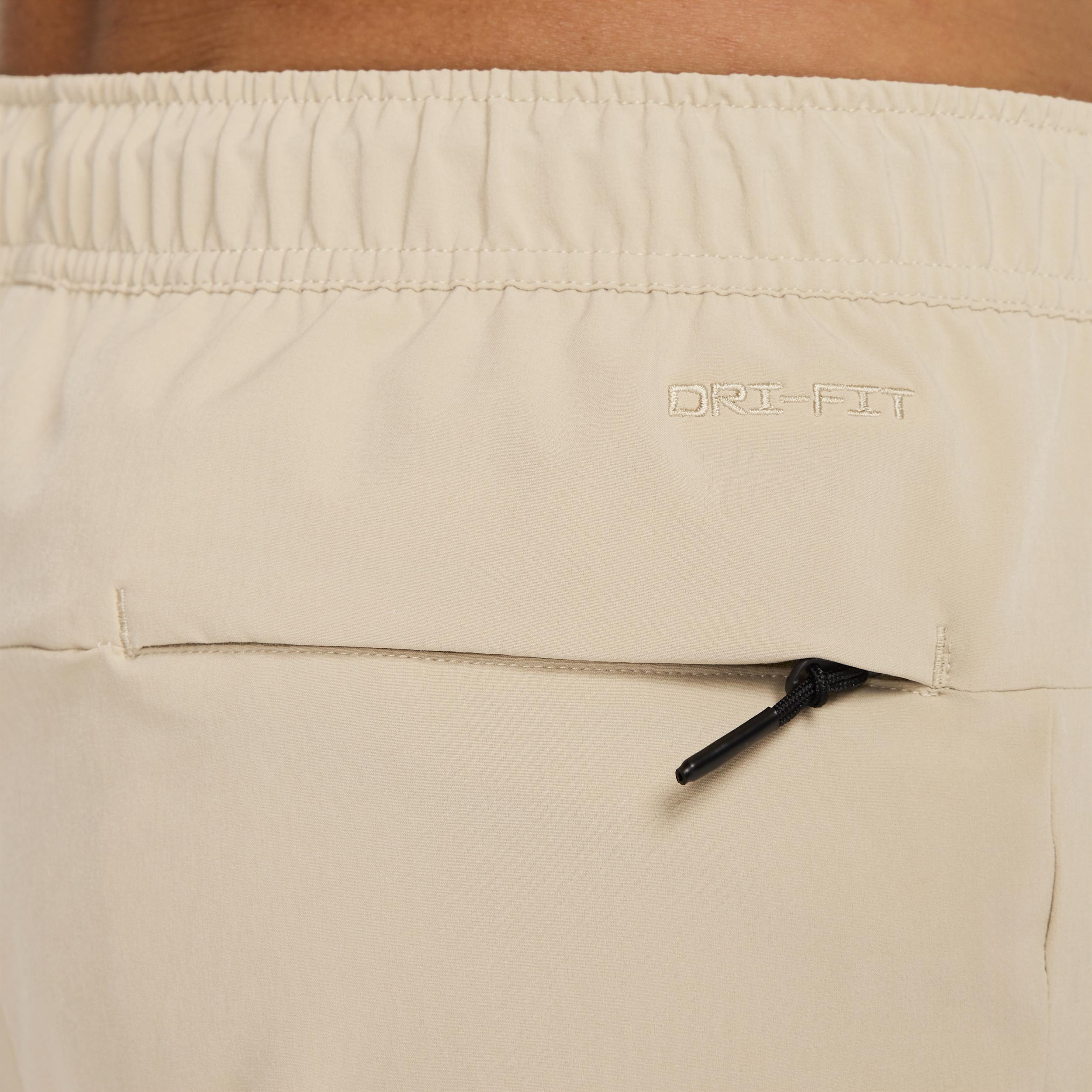 Nike Mens Unlimited Dri-FIT Zippered Cuff Versatile Pants | FB7548-320 Product Image