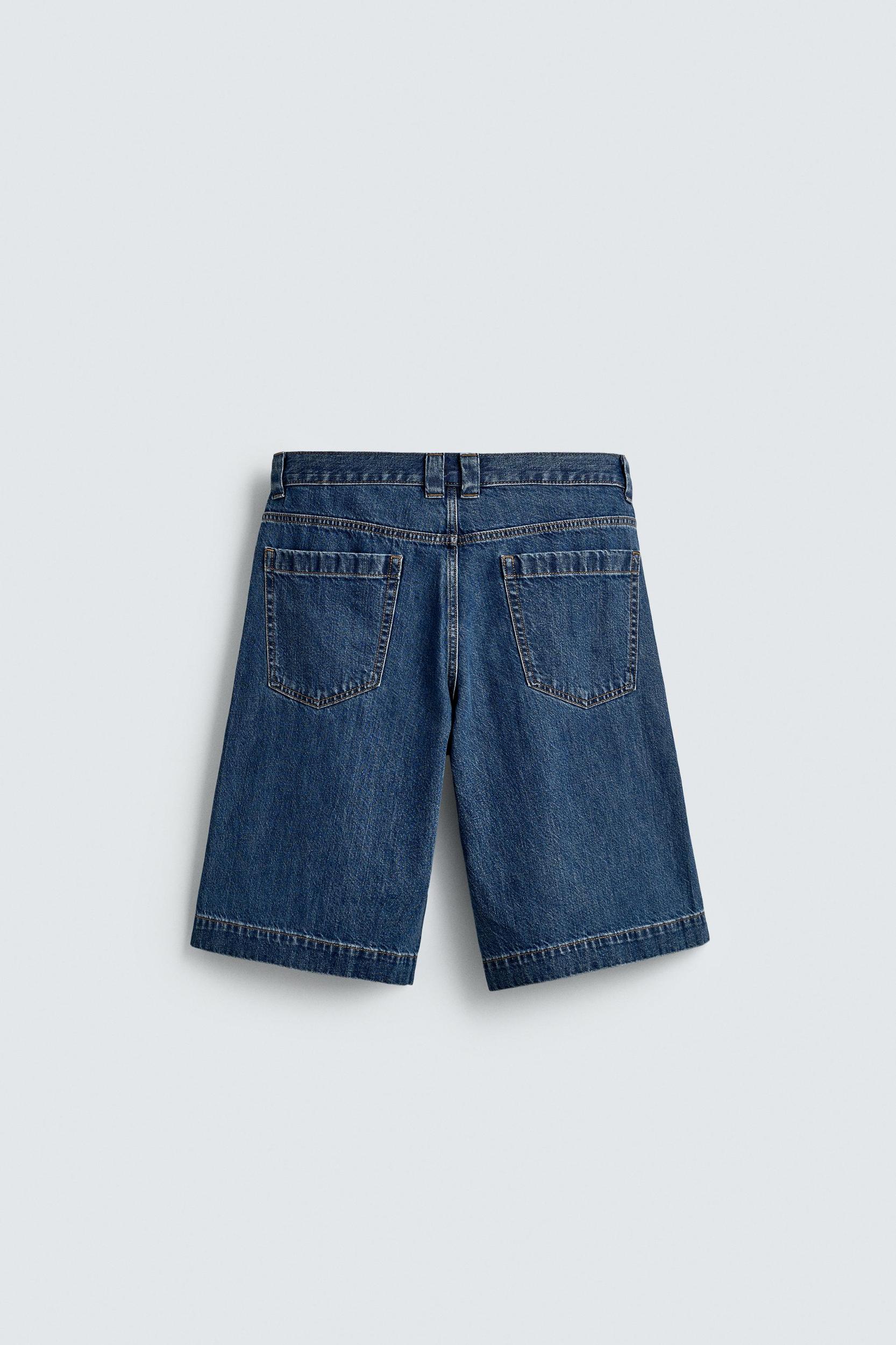 PLEATED RELAXED FIT DENIM SHORTS Product Image