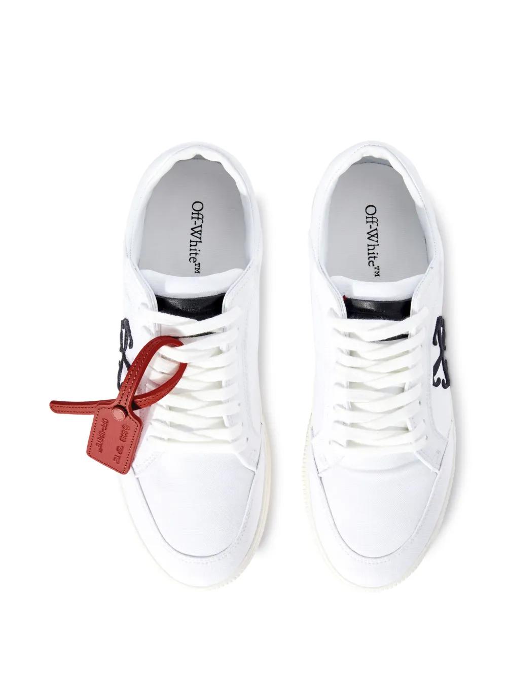 Vulcanized contrasting-tag canvas sneakers Product Image