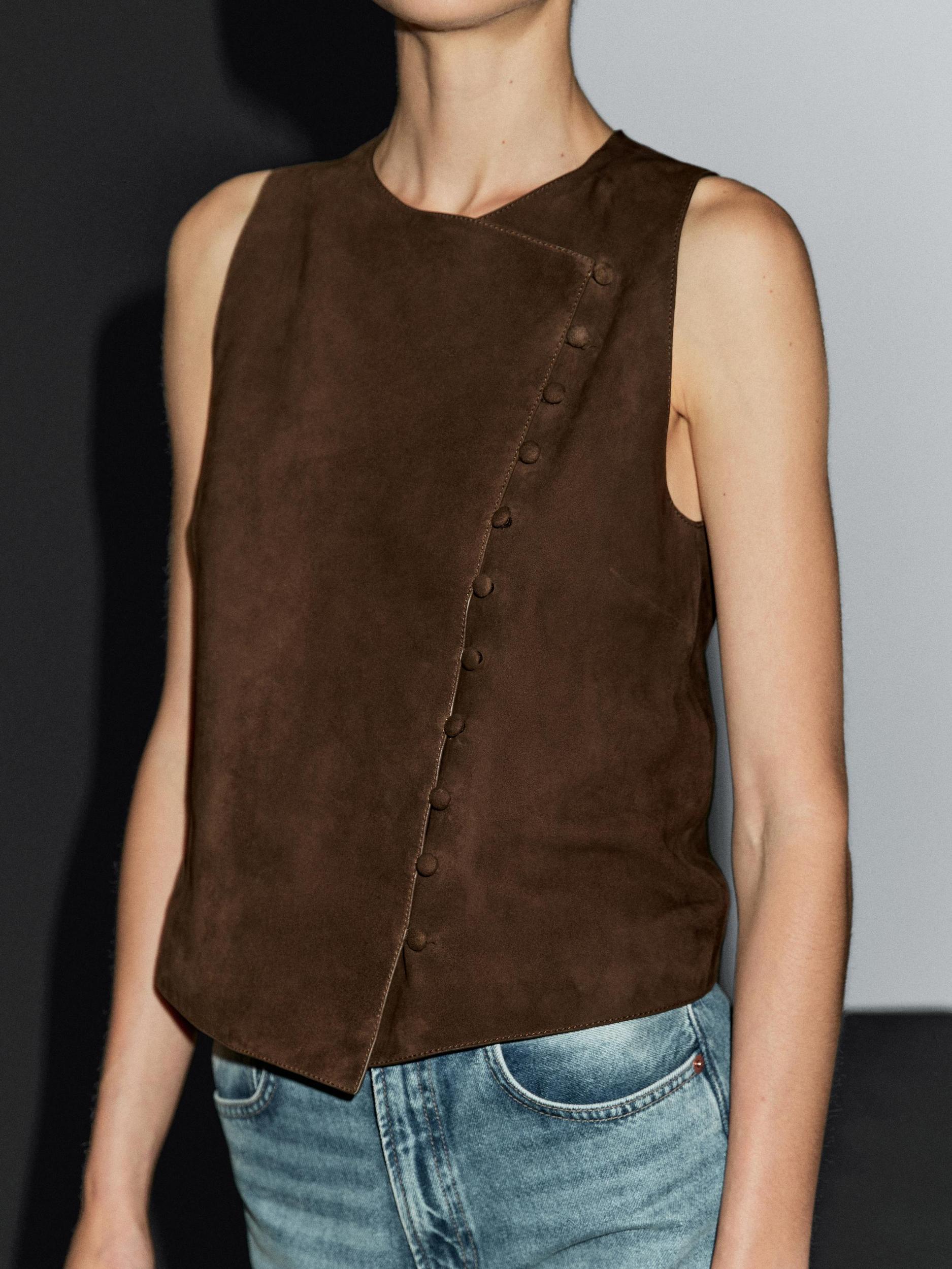 Short suede leather waistcoat with buttons Product Image