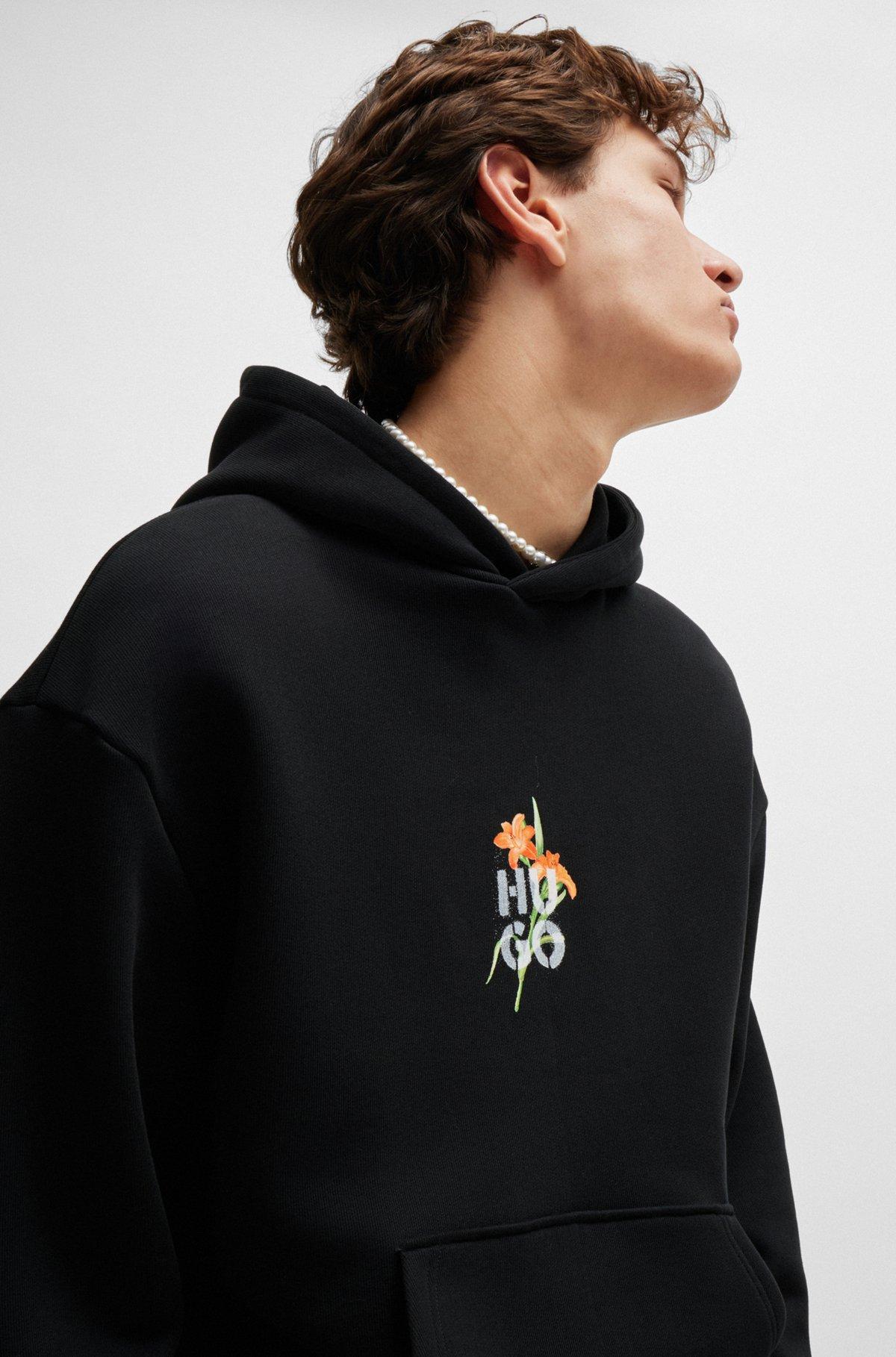 Oversize-fit hoodie with floral artwork Product Image