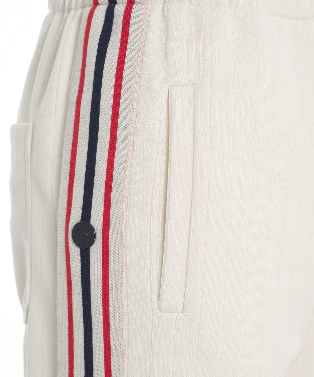 Joggers with side buttons Product Image