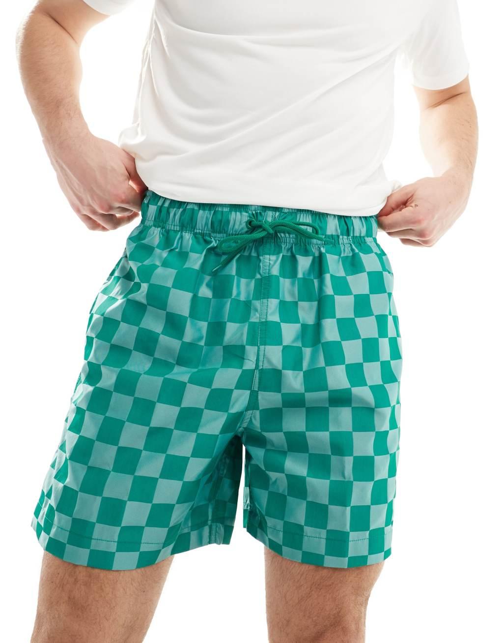 Nike Club checkerboard shorts in green Product Image