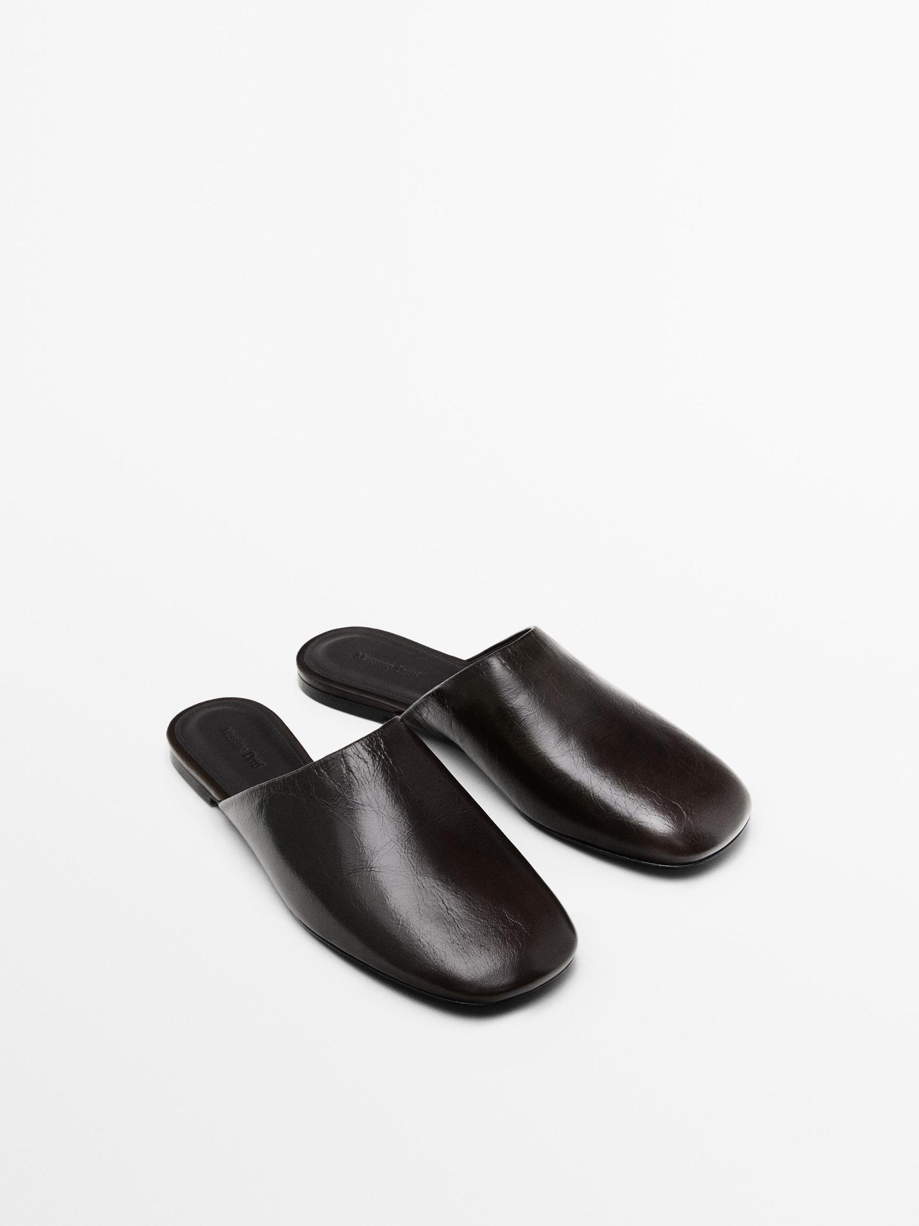 Flat leather mules Product Image