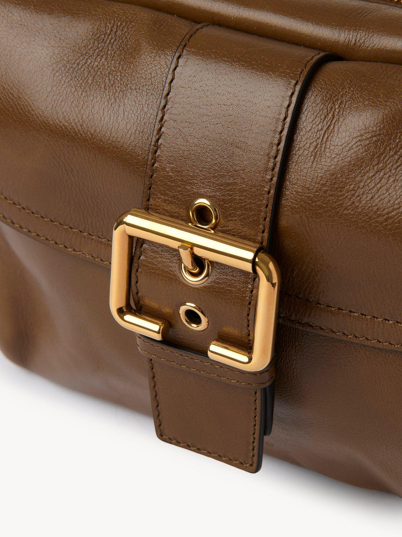 Camera bag in shiny leather Product Image