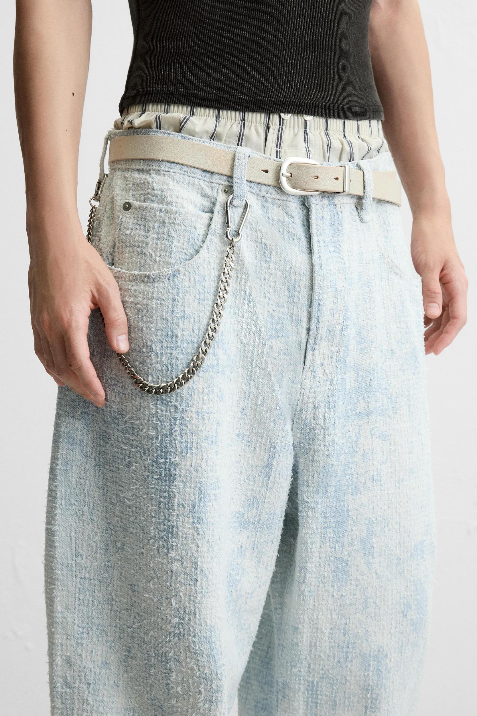 DISTRESSED FINISH BAGGY FIT JEANS Product Image