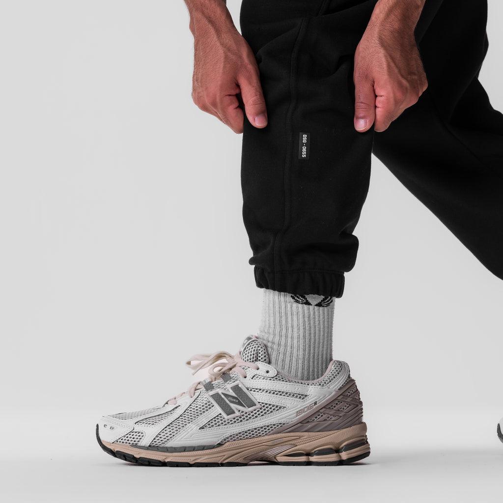 0655. Tech-Terry™ Oversized Sweats - Black "Stacked Wings" Product Image