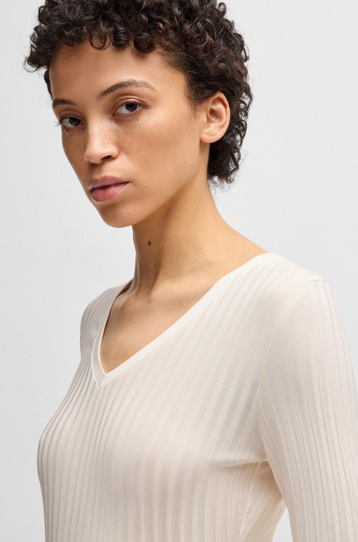 Long-sleeved V-neck top in lustrous ribbed jersey Product Image