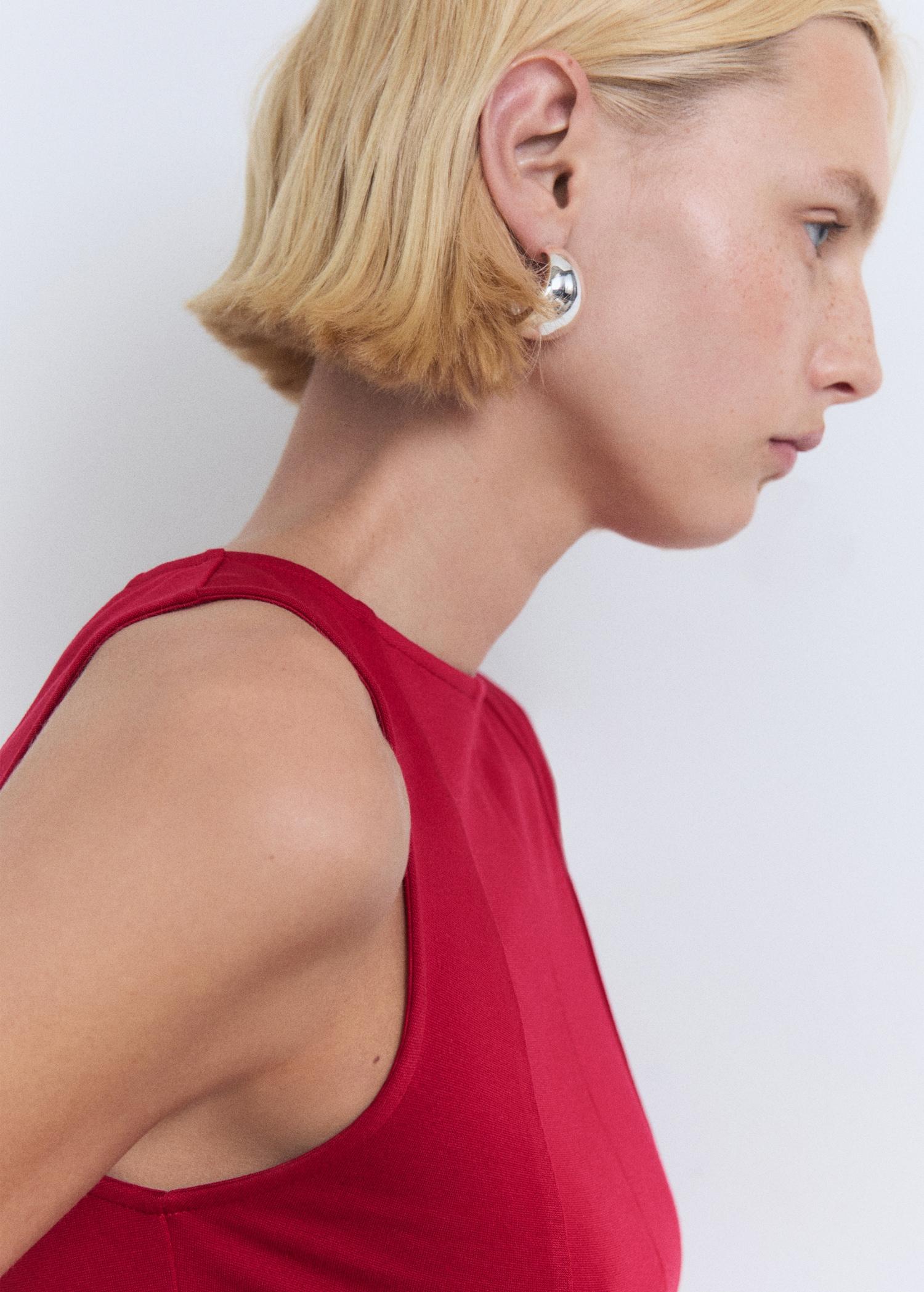 Peplum top with seam detail - Women | MANGO USA Product Image