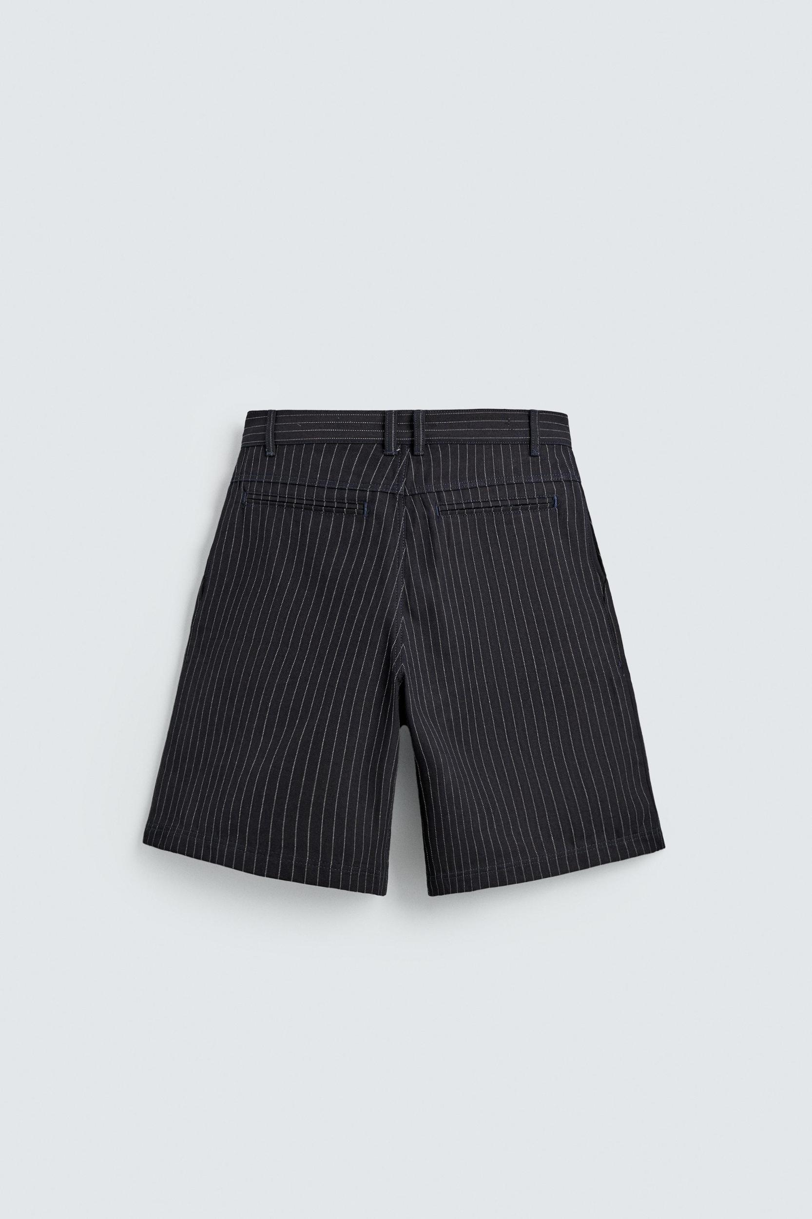PINSTRIPED PLEATED SHORTS Product Image