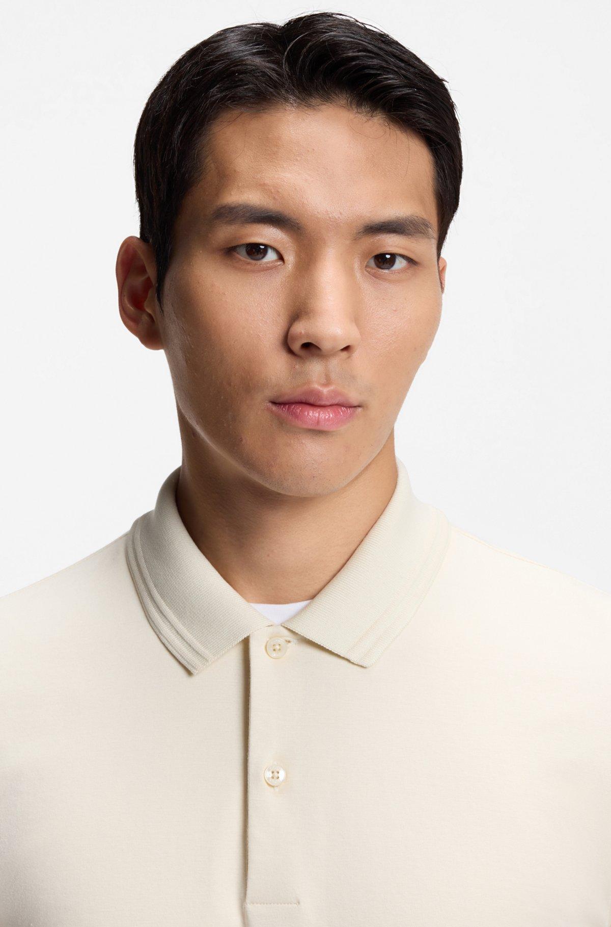 Monogram-placket polo shirt in a cotton blend Product Image