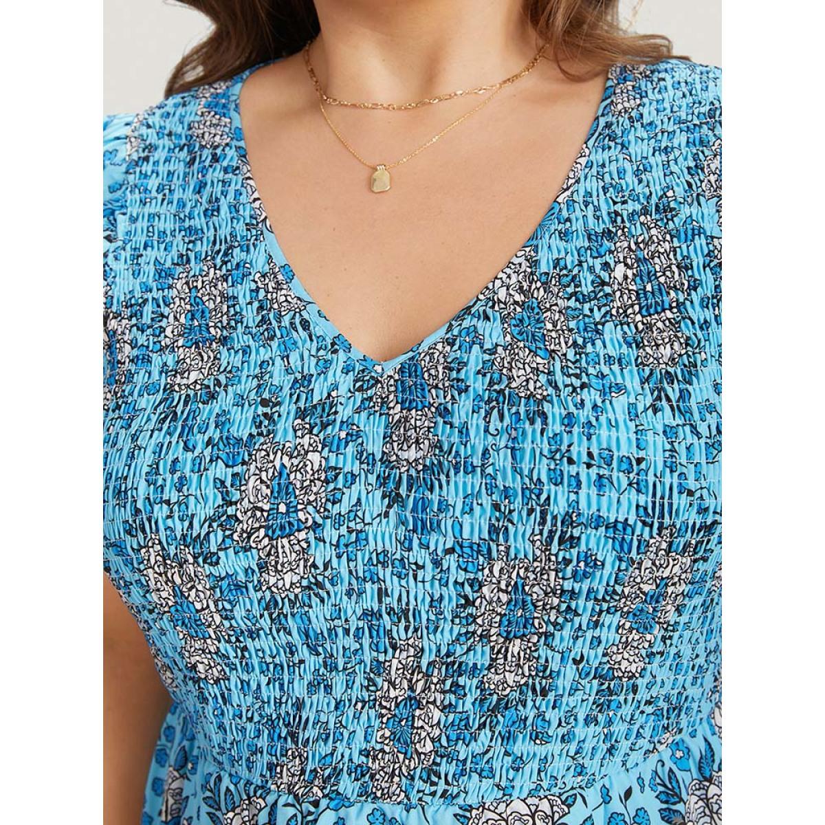 Plus Size Floral Print Shirred Ruffle Cap Sleeve Layered Hem Dress Cerulean Women Elegant Shirred V-neck Cap Sleeve Curvy Knee Dress BloomChic 26/4X Product Image