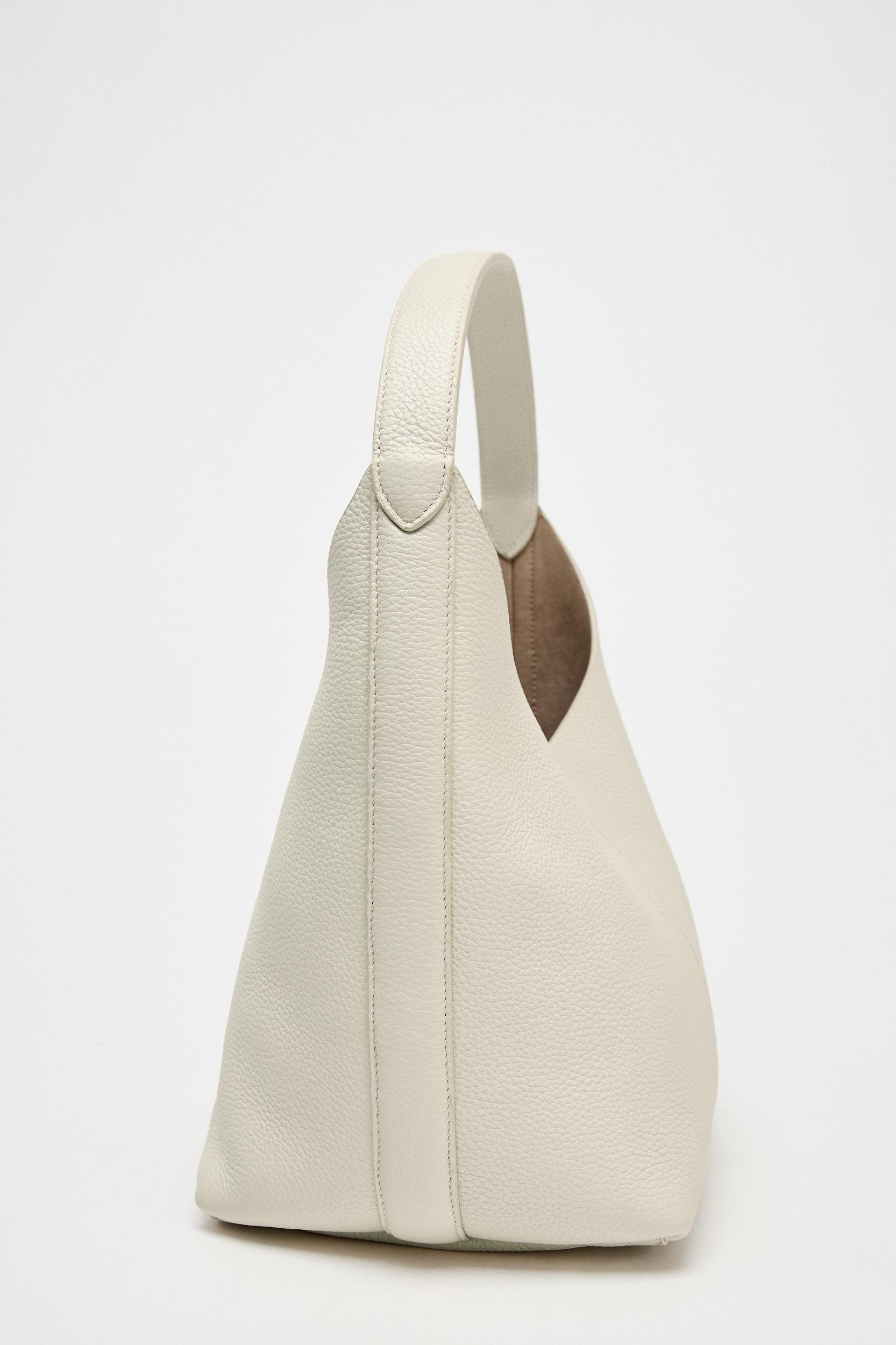 GRAINED LEATHER BUCKET BAG Product Image