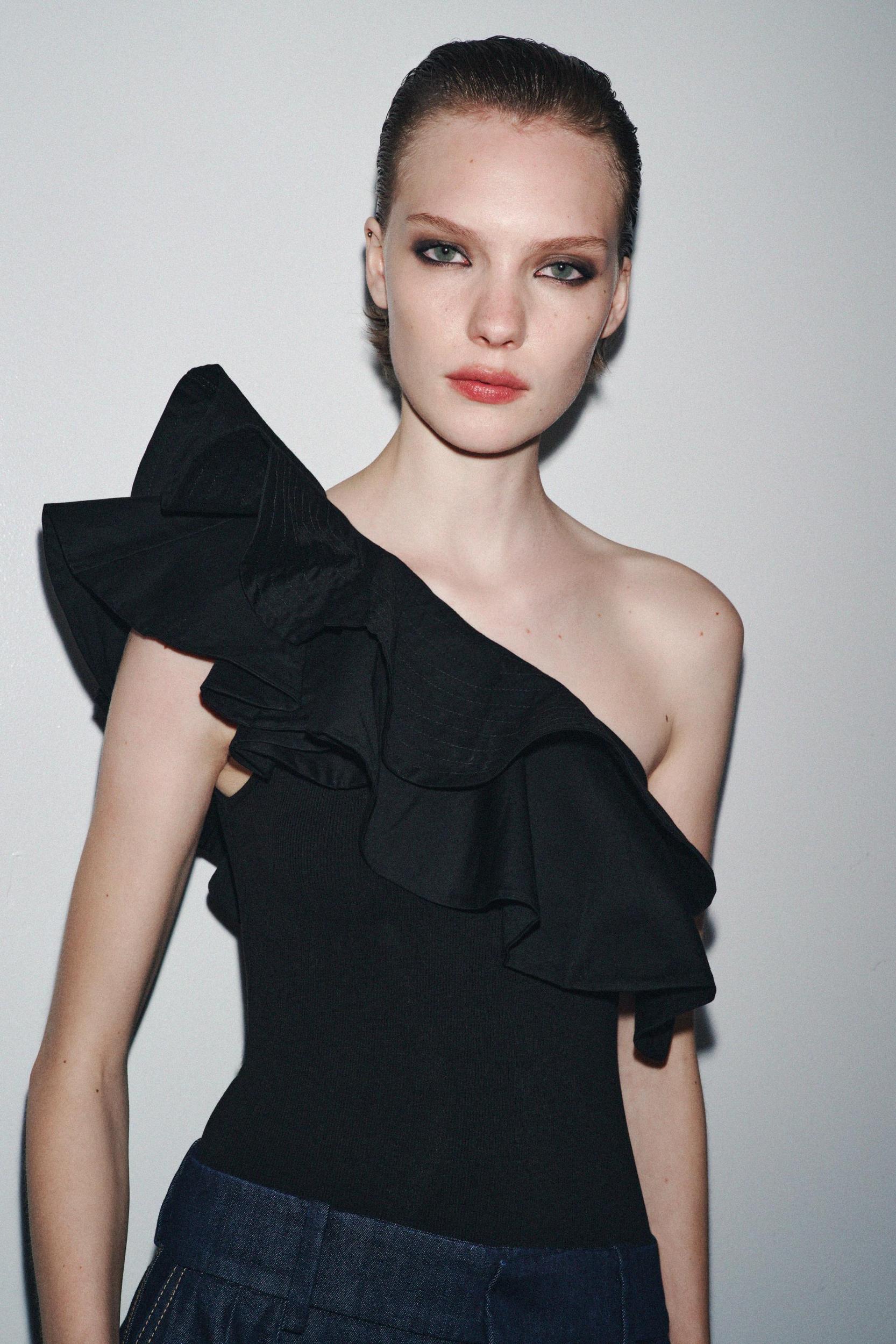 ASYMMETRIC BODYSUIT WITH CONTRASTING RUFFLE Product Image