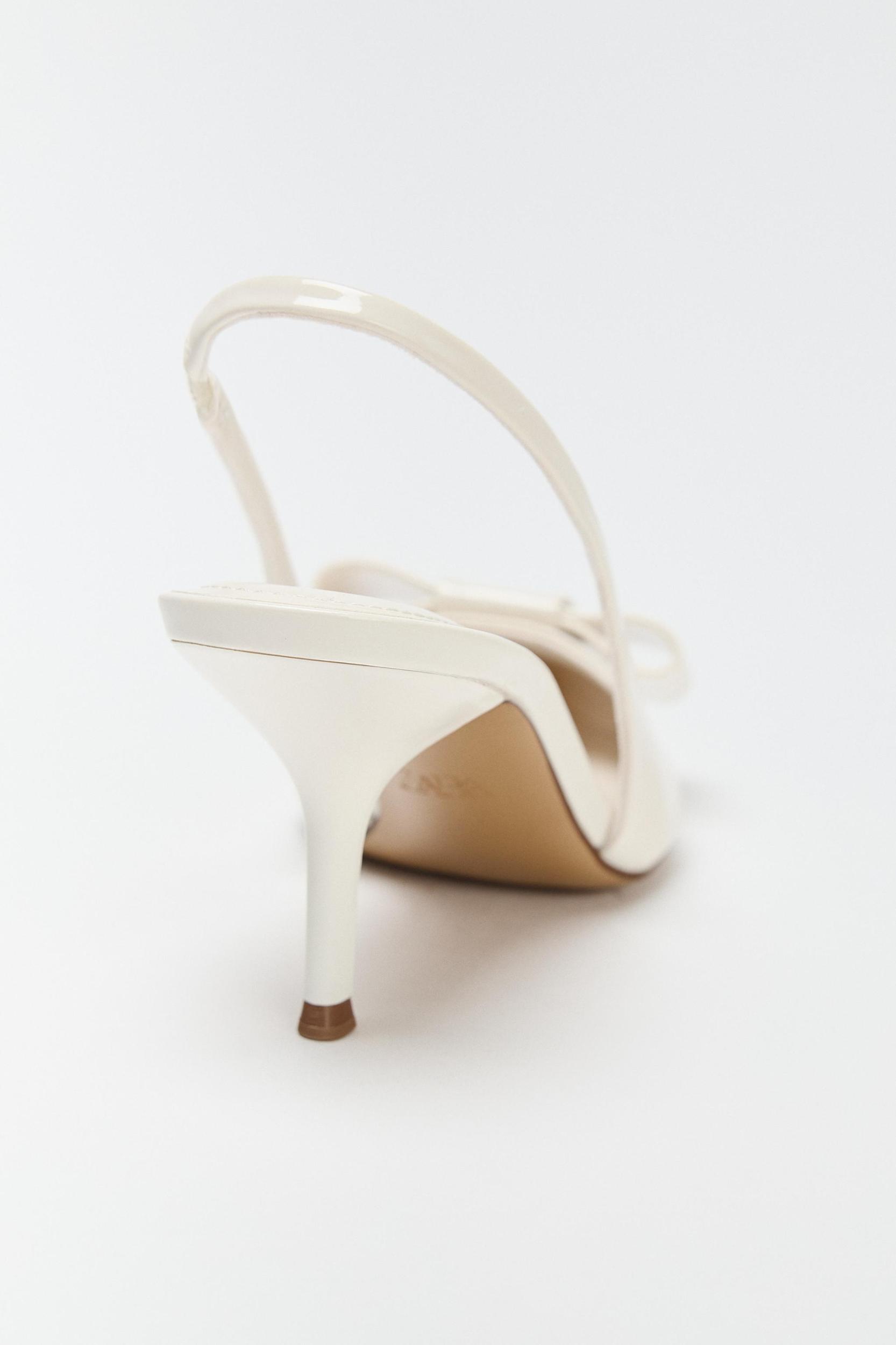 PATENT FINISH BOW HEELS Product Image
