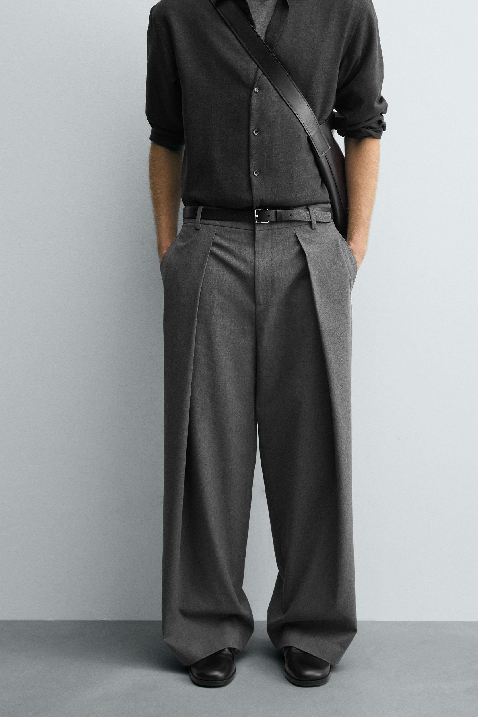 PLEATED WIDE FIT PANTS Product Image