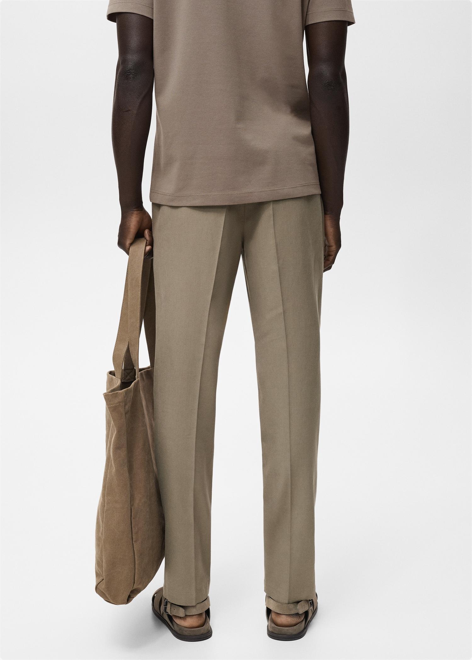 Cotton tapered crop pants - Men | MANGO USA Product Image