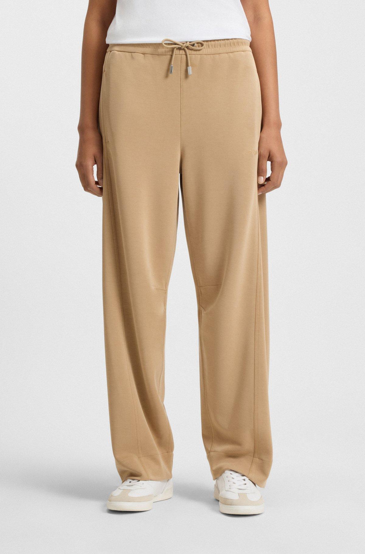 Balloon trousers in stretch jersey with embroidered logo Product Image