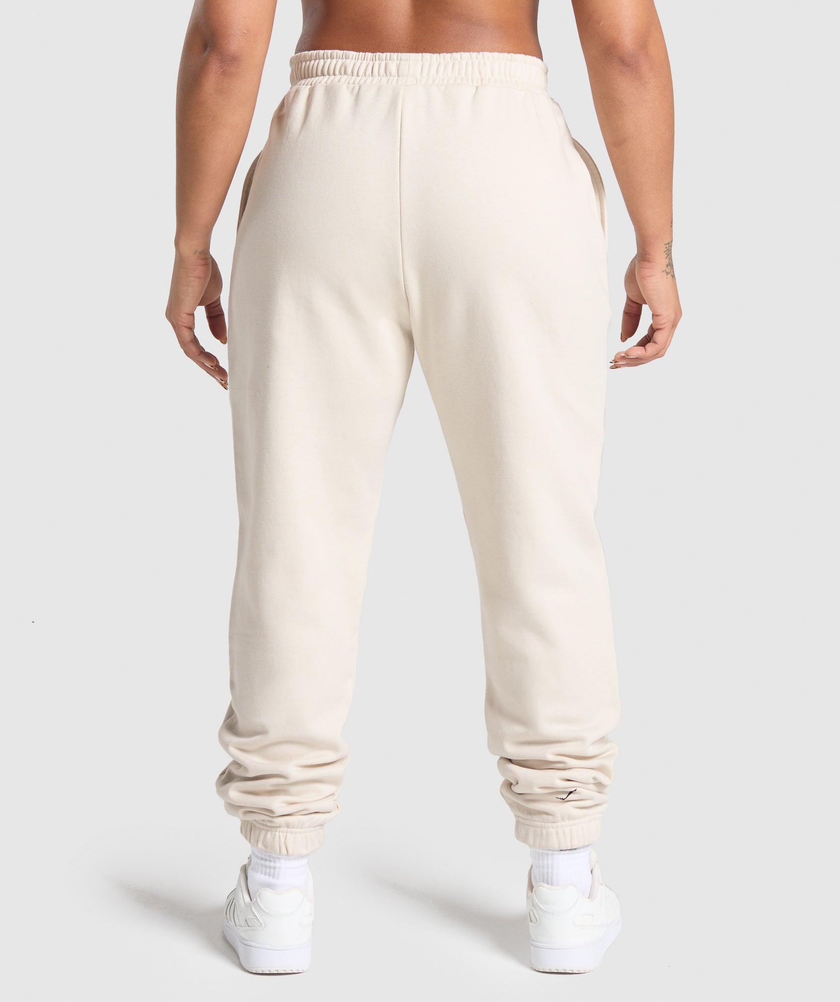 Gymshark Lifting Essentials Graphic Brushed Oversized Joggers - Oat White Female Product Image