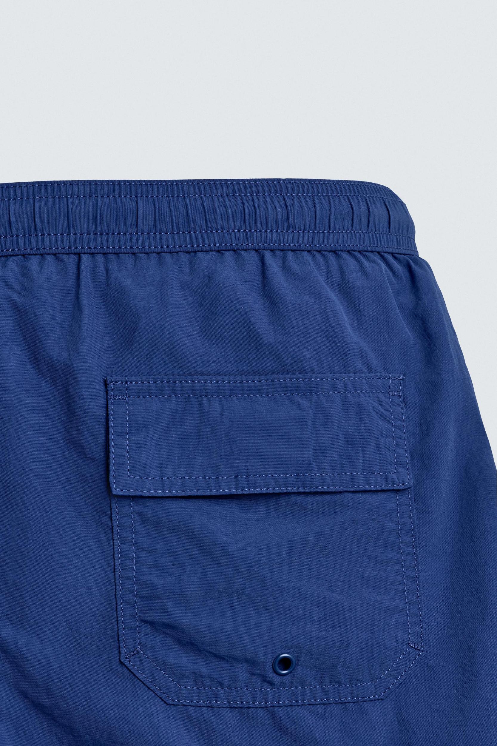 CONTRAST SHORT SWIMSUIT Product Image