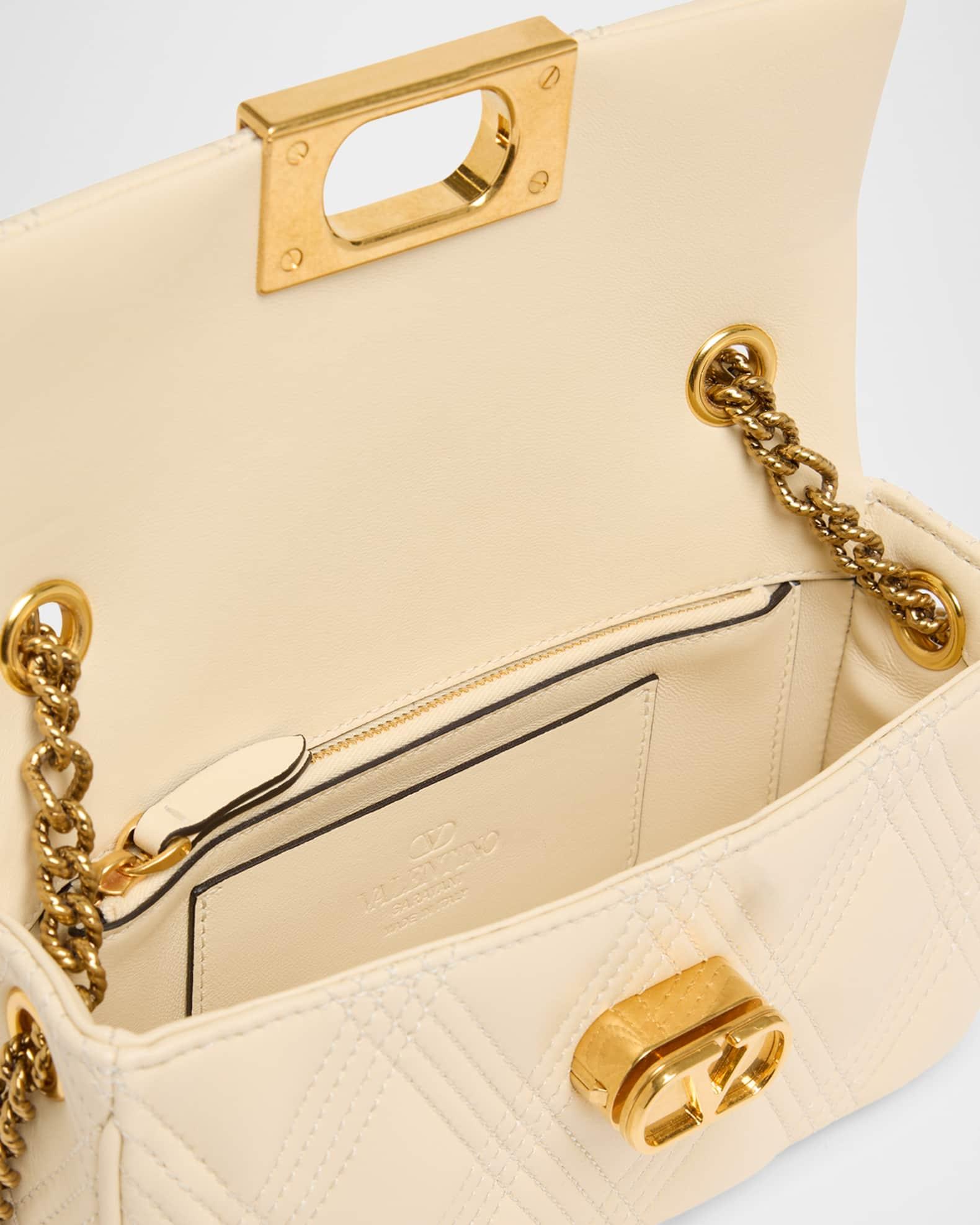 Rockstud Quilted Leather Top-Handle Bag Product Image