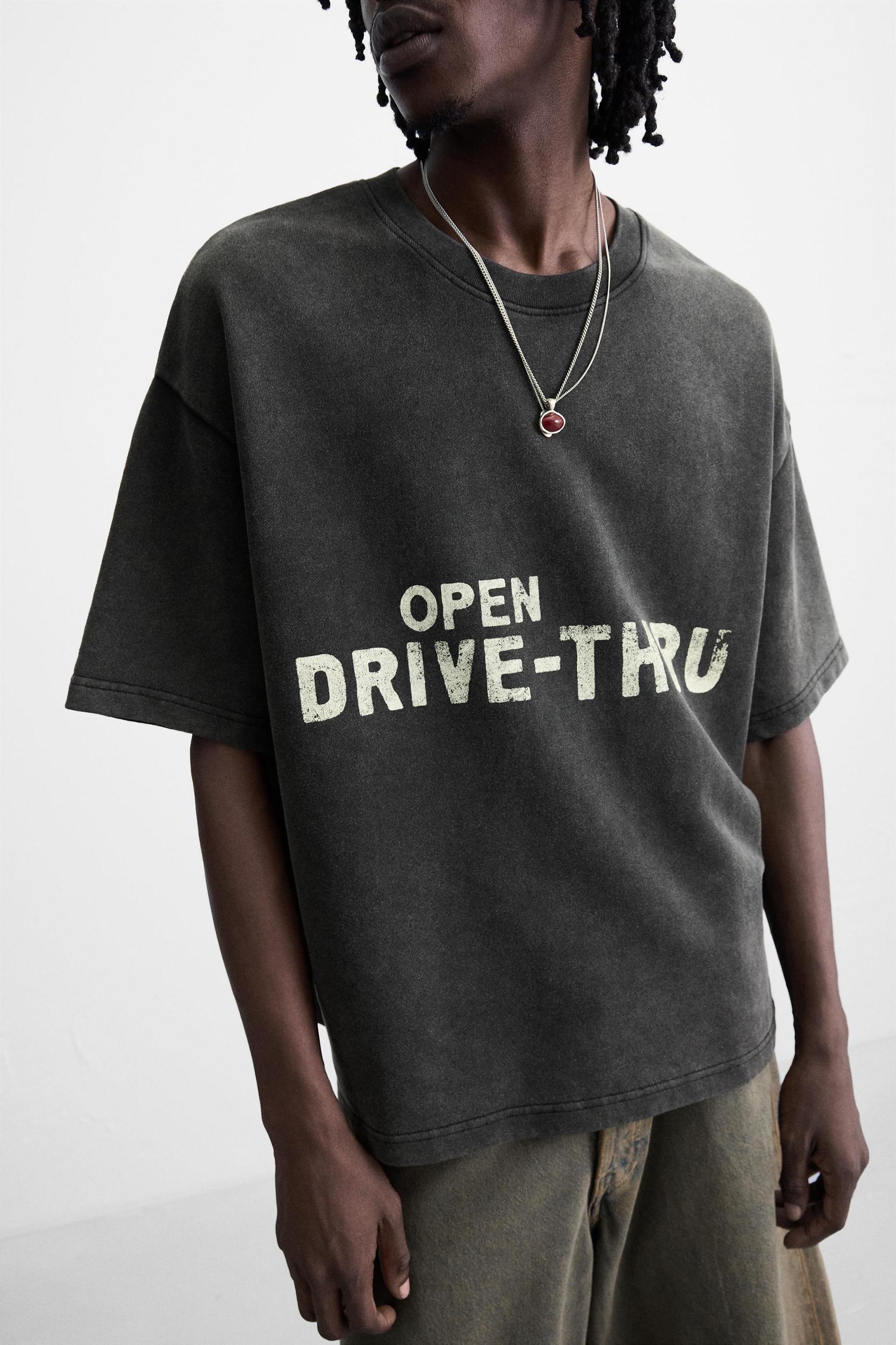 WASHED SWEATSHIRT WITH GRAPHIC PRINTS Product Image