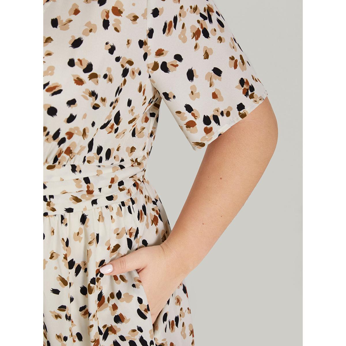Plus Size Leopard Print Empire Waist Ruffle Hem Deep V Neck Dress Beige Women Elegant Ruched Deep V-neck Short sleeve Curvy Knee Dress BloomChic 30/6X Product Image