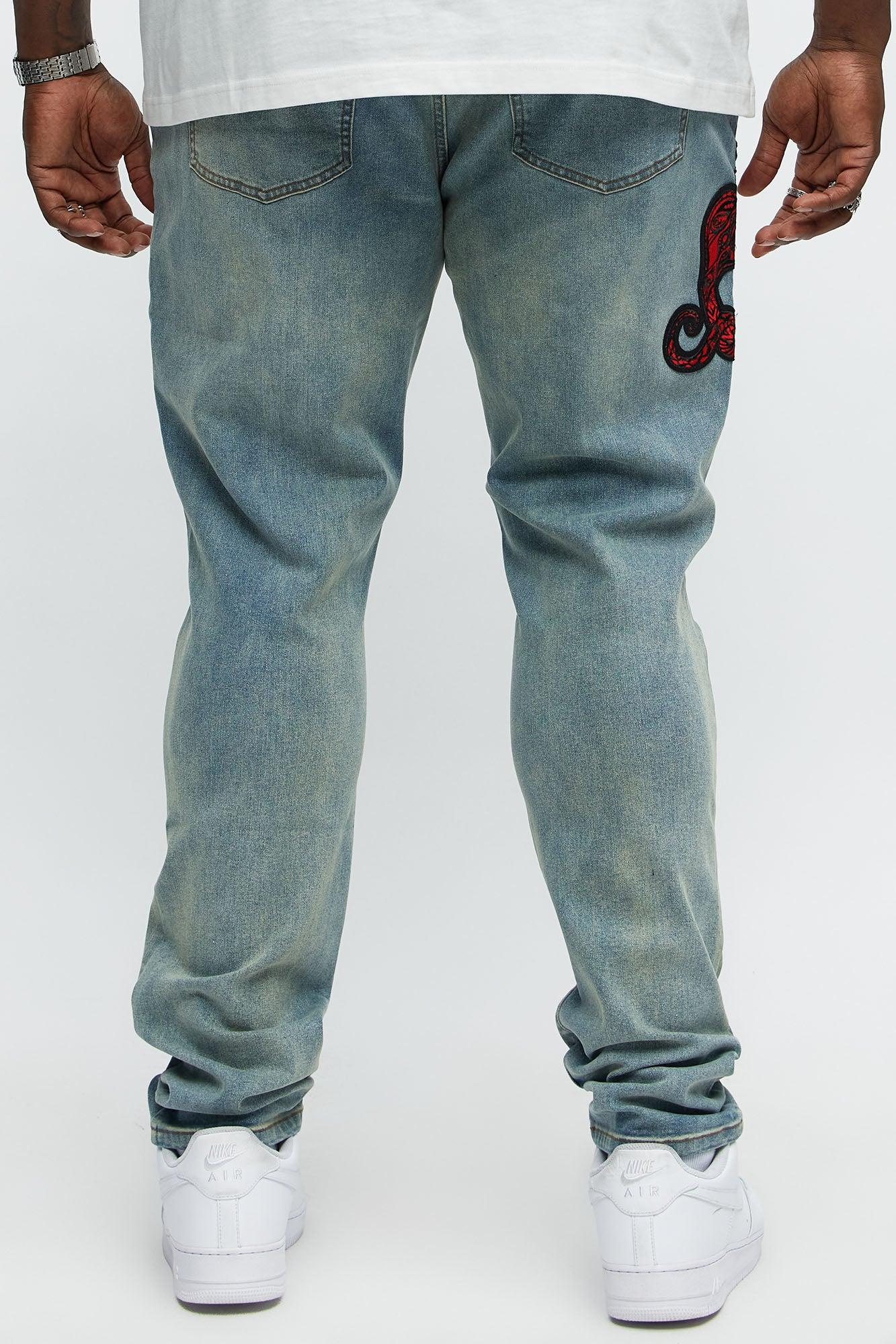 Side Snake Rip And Repair Stacked Skinny Jeans - Vintage Blue Wash Product Image