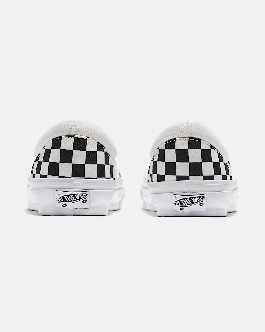Premium Classic Slip-On Checkerboard Shoe in Checkerboard Black / Off White| Vans US Product Image