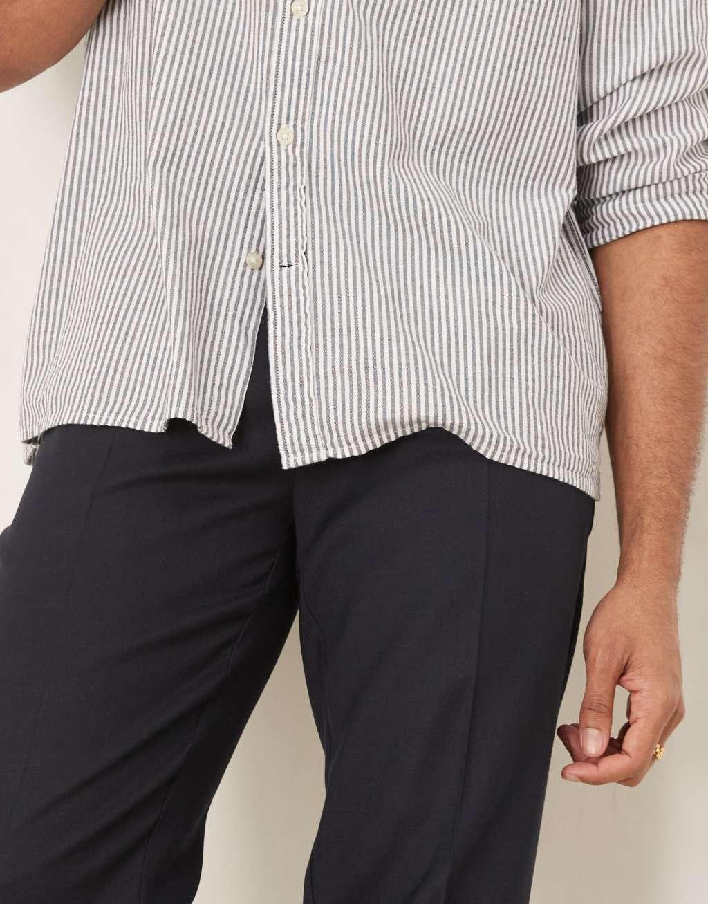 ASOS DESIGN smart tapered pants with front pleat in navy microtexture Product Image