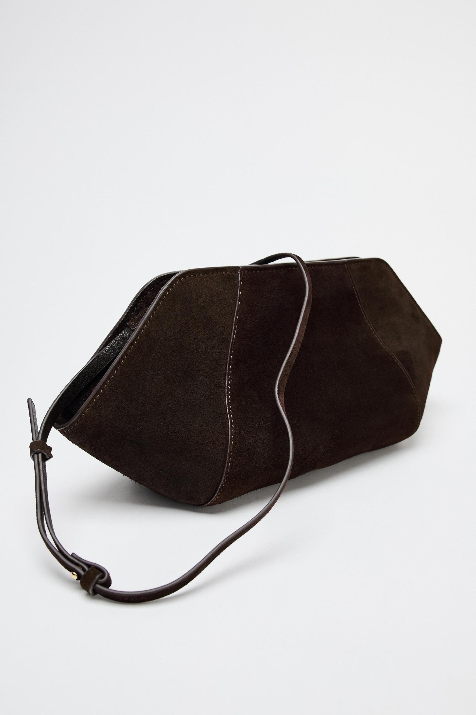 SPLIT LEATHER TOPSTITCH CLUTCH Product Image