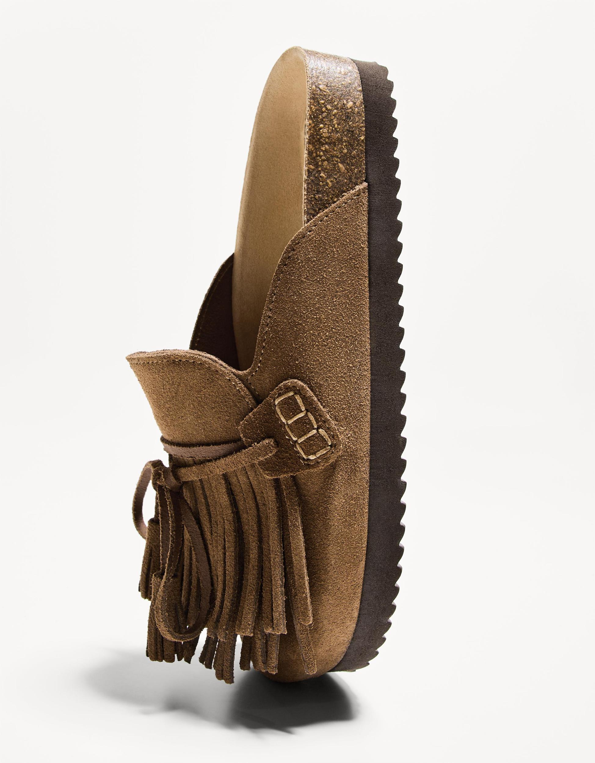 Flat LEATHER clogs with fringe detail Product Image